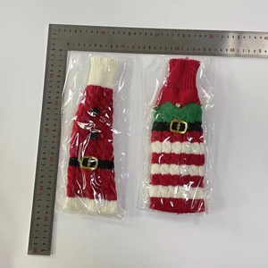Detailed size measurement of knitted Santa and Elf wine bottle covers with belt and bell