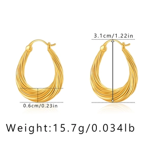 Detail view of 18K gold plated twisted hoop earrings with dimensions 3.1cm by 0.6cm