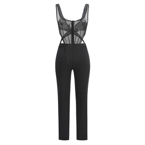 Detailed close-up of sexy black jumpsuit featuring sheer mesh bodice and high waist trousers