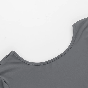 Detailed view of the grey round neckline and fine knit fabric on the slim romper