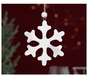 Detailed view of white wooden snowflake ornament with natural jute rope and wooden bead