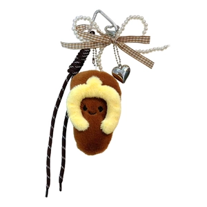 Adorable brown plush slipper keychain featuring pearl beads and a heart charm bag accessory