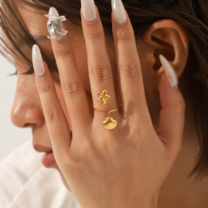 18K gold-plated stainless steel open ring with starfish and seashell charms on model