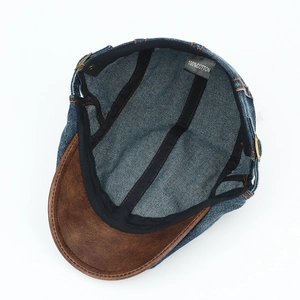 Vintage denim flat cap in blue with brown faux leather brim and cotton lining