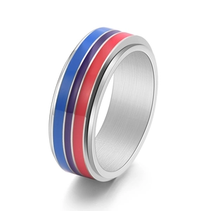 Rotating stainless steel spinner ring with blue, purple and red enamel stripes on silver base