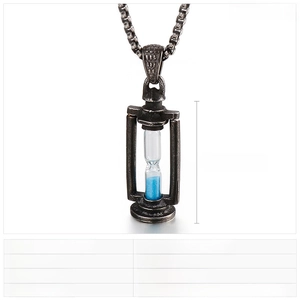 Macro view of stainless steel hourglass pendant featuring blue sand and punk style texture