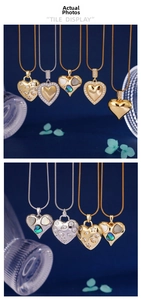 Detailed view of luxury gold heart pendants with shimmering zircon and abalone shell insets