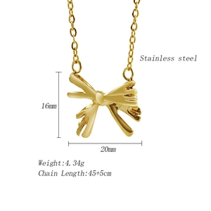 Detail view of gold bow necklace with dimensions 16mm height and 45cm chain length