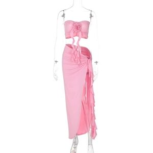 Detailed view of pink two-piece set with 3D rose tube top and side slit ruffle skirt