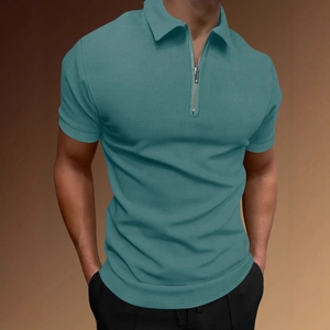 Men's turquoise athletic polo shirt with quarter zip and textured knit fabric