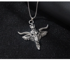 Macro detail of gothic stainless steel bull head pendant with intricate silver texture