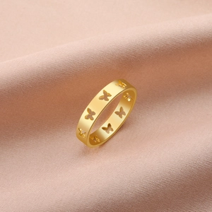 Elegant 18k gold-plated stainless steel openwork butterfly ring on pink silk fabric