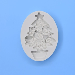 White Christmas tree silicone mold with detailed star and leaf patterns for DIY baking