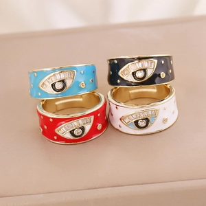 Colorful evil eye rings in light blue, black, red and white with gold finish