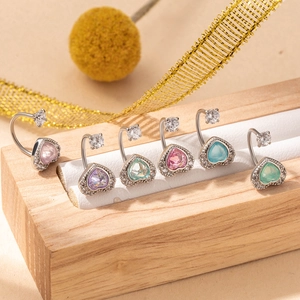 Set of heart-shaped stainless steel belly rings with colorful cubic zirconia crystals