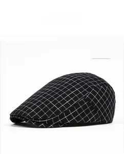 Side view of black windowpane plaid ivy cap showing refined stitching and fabric texture