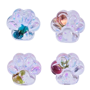 Iridescent cat paw resin crafts with dried flowers and sequins in four-grid display