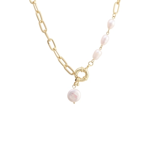 Baroque pearl pendant necklace with gold chain and toggle clasp in a minimalist style