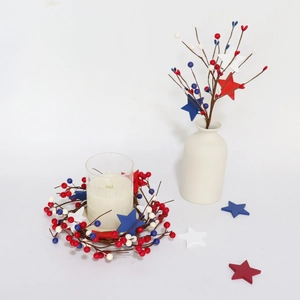 Patriotic red white and blue berry star wreath and branches for US Independence Day decor