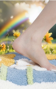 Detail of thick absorbent daisy bath mat showing rapid-dry fluffy flocked fiber texture