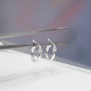 Minimalist S925 sterling silver hoop earrings with a polished finish for daily wear
