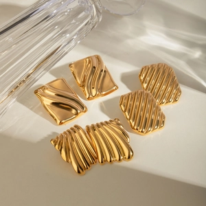 Classic 18K gold plated stainless steel square earrings with wave texture on white surface