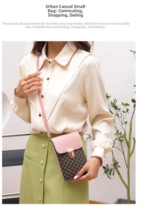 Detail of pink flap and monogram pattern crossbody phone bag with gold metal lock