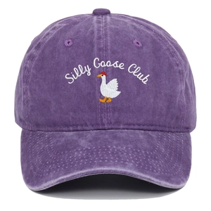 Detail of Silly Goose Club embroidery on a vintage washed purple cotton baseball cap