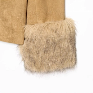 Detailed view of camel suede jacket with plush brown faux fur trim on the sleeves