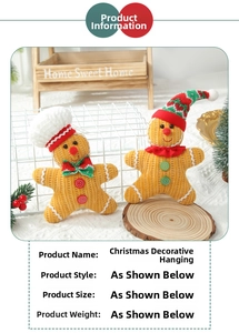 Detail of plush gingerbread man and woman figurines in a festive Christmas display