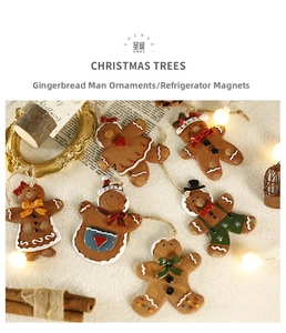 Detailed set of six resin gingerbread man ornaments with colorful icing on vintage background