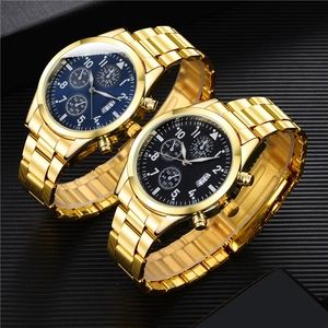 Detail of steel business watches featuring multi-function sub-dials and luminous date