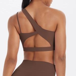 Asymmetric single shoulder sports bra in dark brown with back geometric cutout details