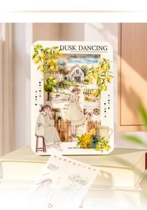 Detail of DIY lemon-themed decorative stickers featuring a girl and rustic cabin scenes