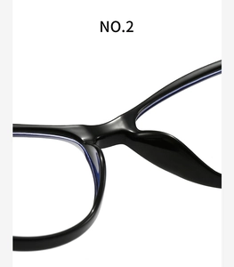 Detail shot of the black polished frame bridge and smooth inner rims of anti-blue light glasses