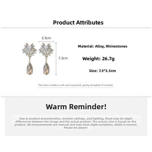 Détails des boucles d'oreilles flocon en strass avec dimensions de 7,3cm de haut et 3,3cm