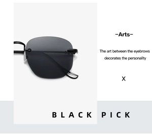 Detail view of black rimless sunglasses with slim metal temples on a minimalist background