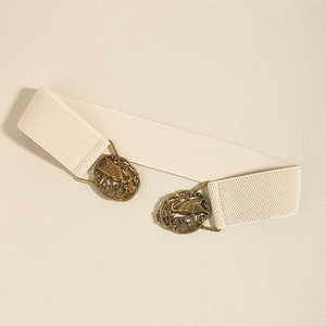 Detail of beige elastic waist belt with antique bronze crane buckles for dresses