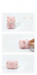 Close-up of pink pig ornament showing 3M adhesive base and non-slip groove design