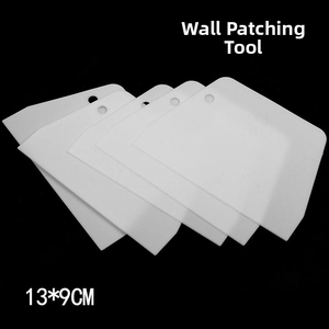 Set of four 13x9CM trapezoid plastic wall spackle scrapers with a hanging hole design