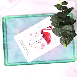Close-up of rectangular resin tray mold with glitter and mint purple gradient texture