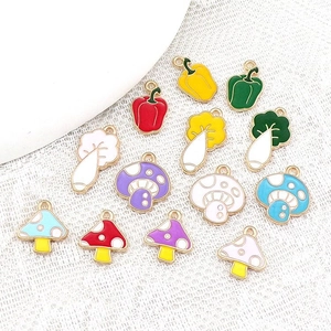 Assorted colorful enamel alloy vegetable pendants including mushrooms and peppers