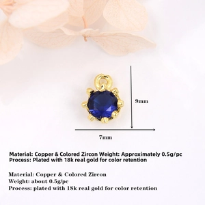Macro shot of 9x7mm blue zircon crown pendant in 18k gold plated copper with size detail