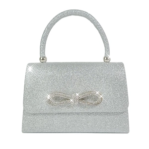 Elegant silver glitter evening bag with sparkling rhinestone bow and rounded handle
