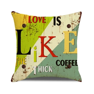 Detail of vintage industrial style linen cushion cover with rustic coffee quote pattern