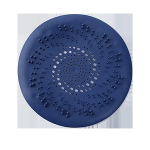 Blue circular silicone drain cover with raised patterns and central drainage holes