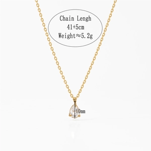Detail view of 10mm teardrop zircon pendant on golden stainless steel necklace chain