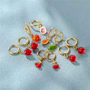 Detail of S925 silver fruit earrings with colorful enamel and gold plating finish