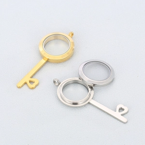 Gold and silver stainless steel heart key locket pendants with glass window and heart tip