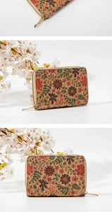 Detail of short wallet with vintage floral print and cork wood grain texture